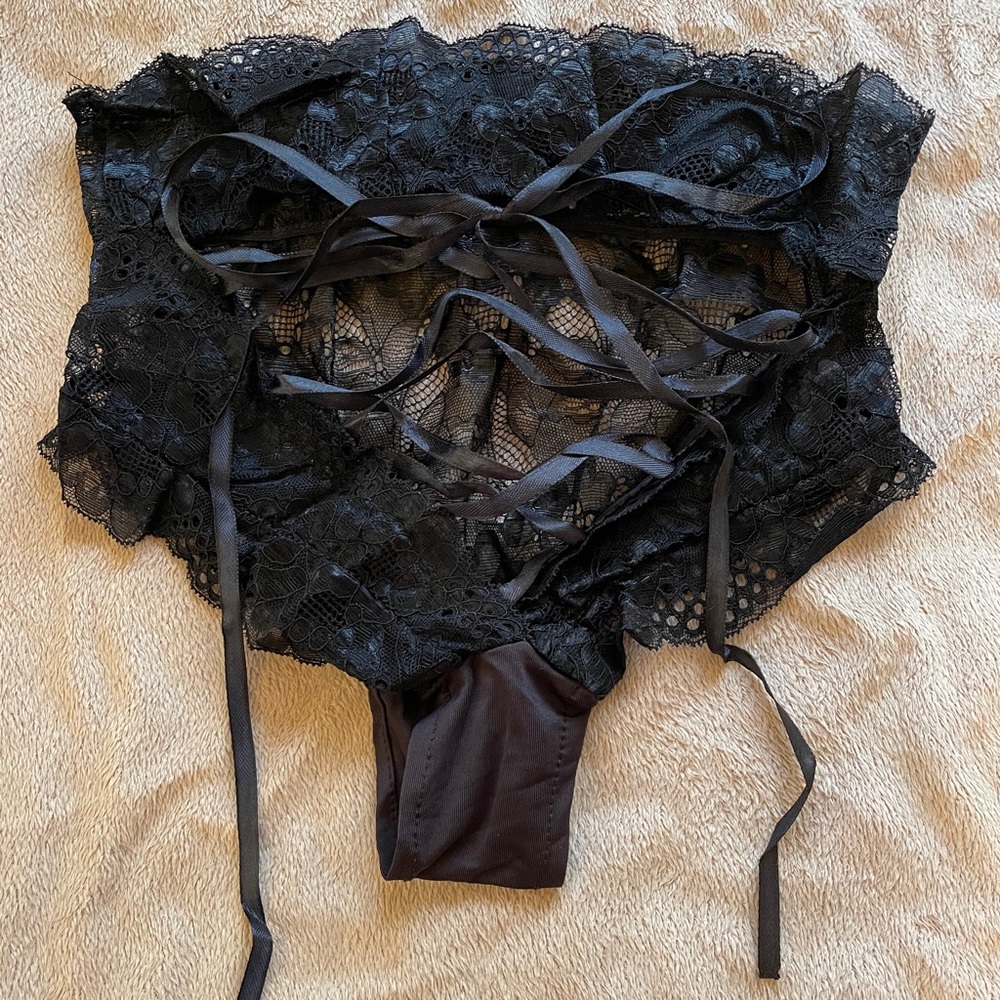 NWOT sexy panties with cross cross detail in back